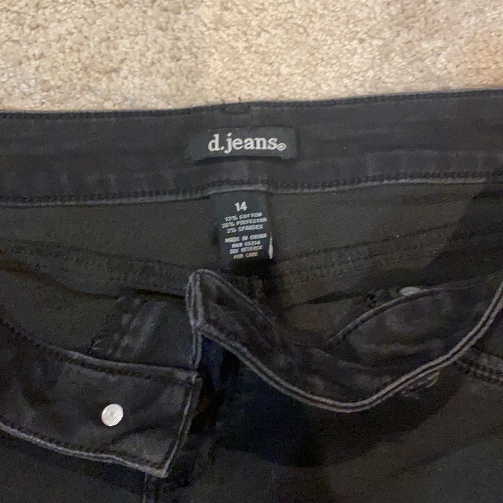 Black Jean Bermuda shorts.